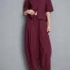 Pantalones acampanados plisados con tacto de papel