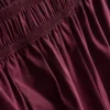 Pantalones acampanados plisados con tacto de papel