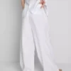 Pantalones anchos de lino plisados de The Edit