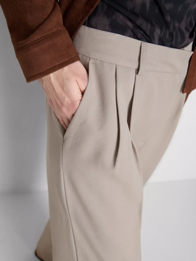 Pantalones anchos plisados