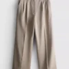 Pantalones anchos plisados