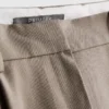 Pantalones anchos plisados