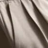 Pantalones anchos plisados