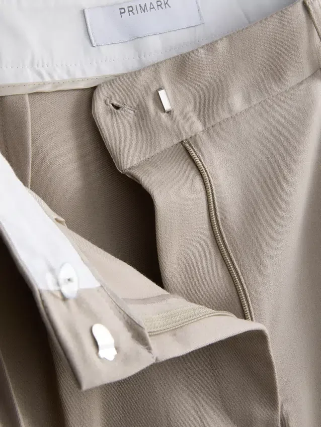 Pantalones anchos plisados