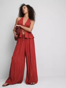 Pantalones brillantes de pierna ancha de Paula Echevarría