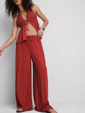 Pantalones brillantes de pierna ancha de Paula Echevarría