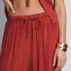 Pantalones brillantes de pierna ancha de Paula Echevarría