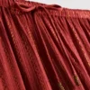 Pantalones brillantes de pierna ancha de Paula Echevarría