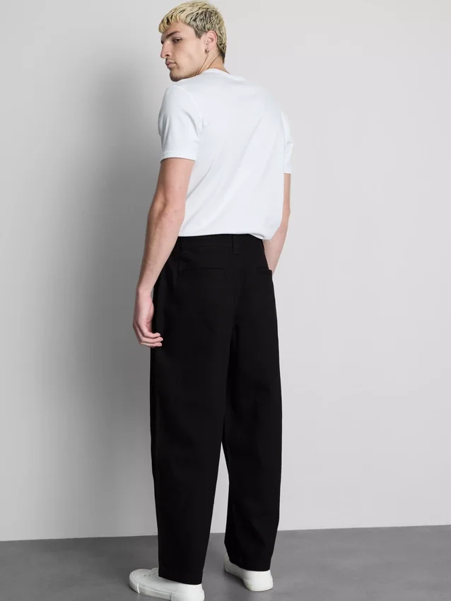 Pantalones chinos holgados de talle medio