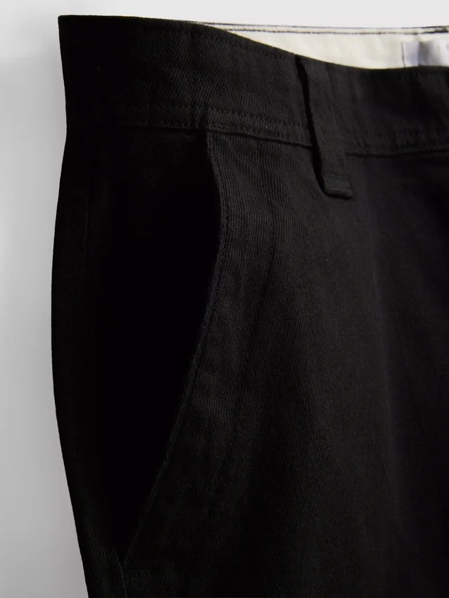 Pantalones chinos holgados de talle medio