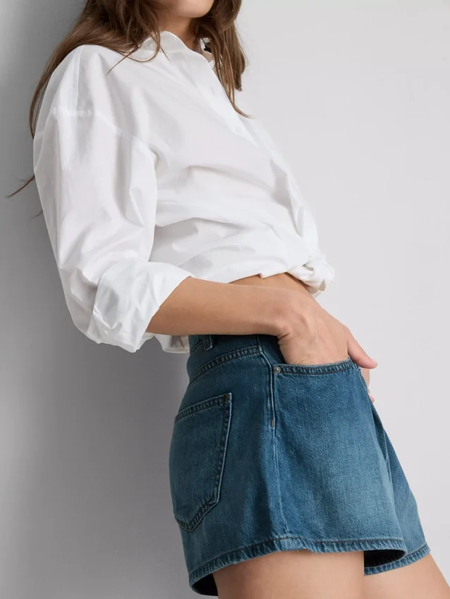 Pantalones cortos acampanados plisados de mezclilla con alto contenido de algodón