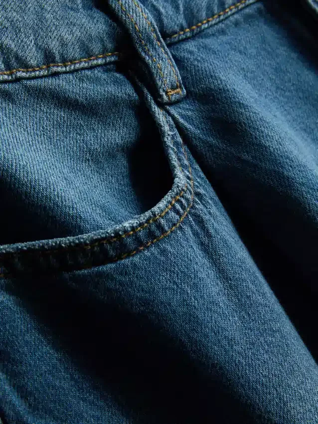 Pantalones cortos acampanados plisados de mezclilla con alto contenido de algodón