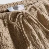 Pantalones cortos arrugados con cordón