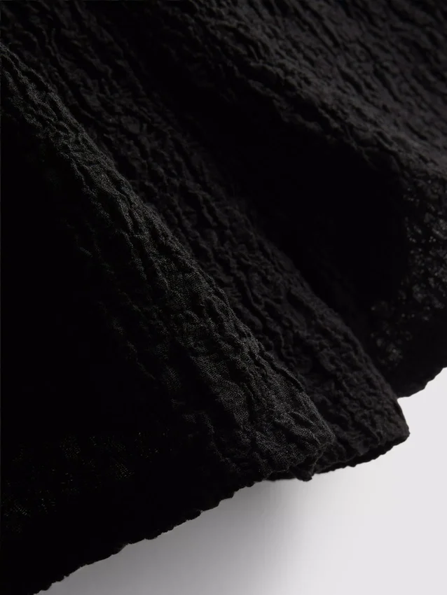 Pantalones cortos arrugados con cordón