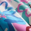 Pantalones cortos con estampado floral tipo graffiti