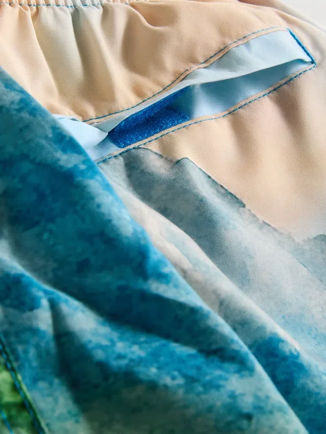 Pantalones cortos con estampado panorámico