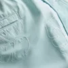 Pantalones cortos con hojas bordadas