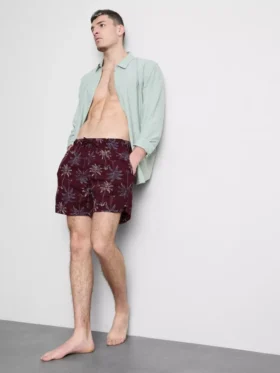 Pantalones cortos con palmeras bordadas