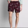 Pantalones cortos con palmeras bordadas