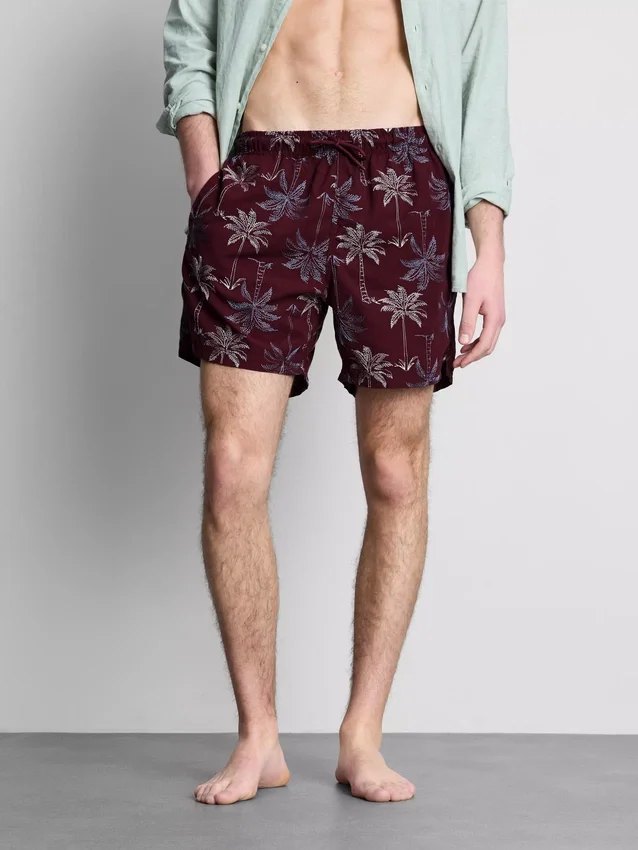Pantalones cortos con palmeras bordadas