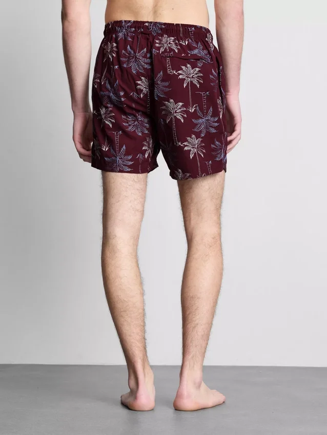 Pantalones cortos con palmeras bordadas