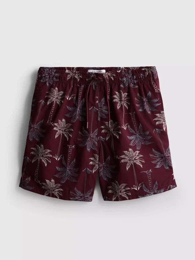 Pantalones cortos con palmeras bordadas