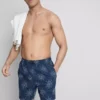 Pantalones cortos con sol bordado