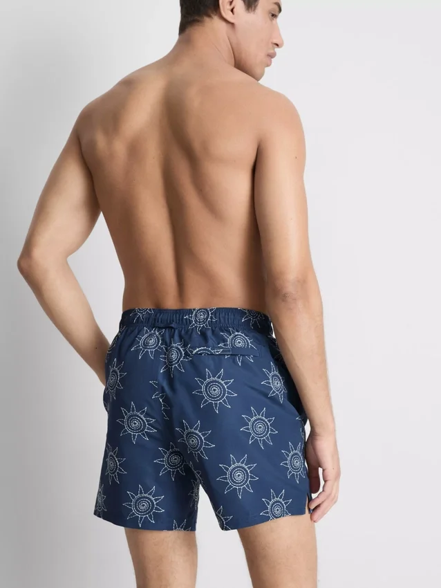 Pantalones cortos con sol bordado