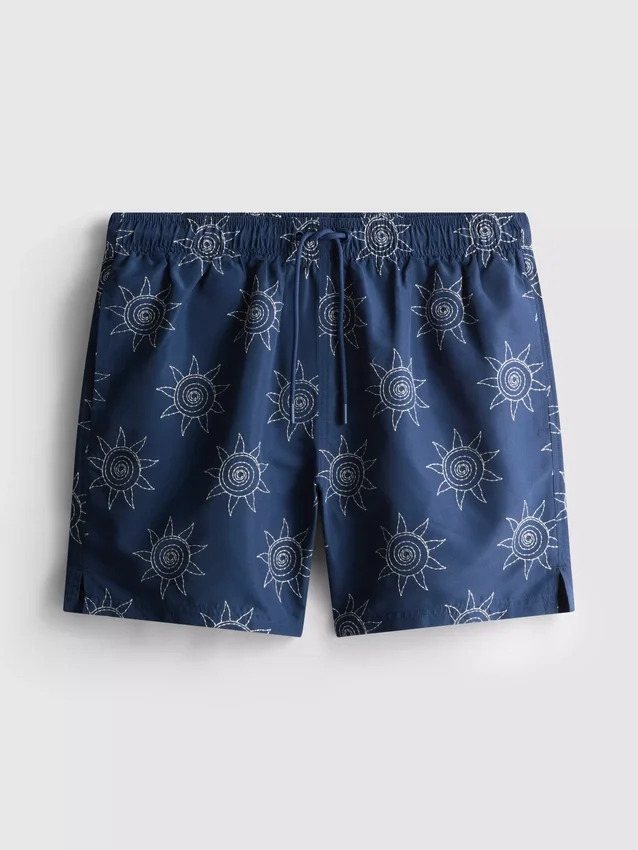 Pantalones cortos con sol bordado