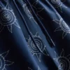 Pantalones cortos con sol bordado