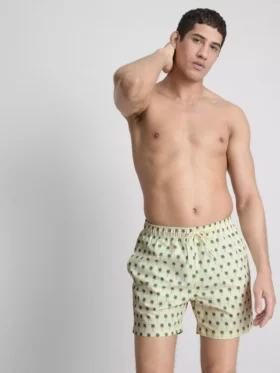 Pantalones cortos con textura de palmeras