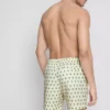Pantalones cortos con textura de palmeras