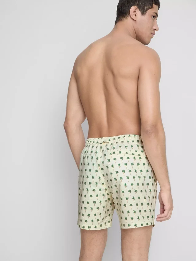 Pantalones cortos con textura de palmeras