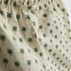 Pantalones cortos con textura de palmeras