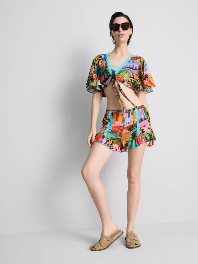 Pantalones cortos con volantes y estampado tropical
