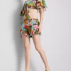 Pantalones cortos con volantes y estampado tropical