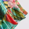 Pantalones cortos con volantes y estampado tropical