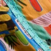 Pantalones cortos con volantes y estampado tropical