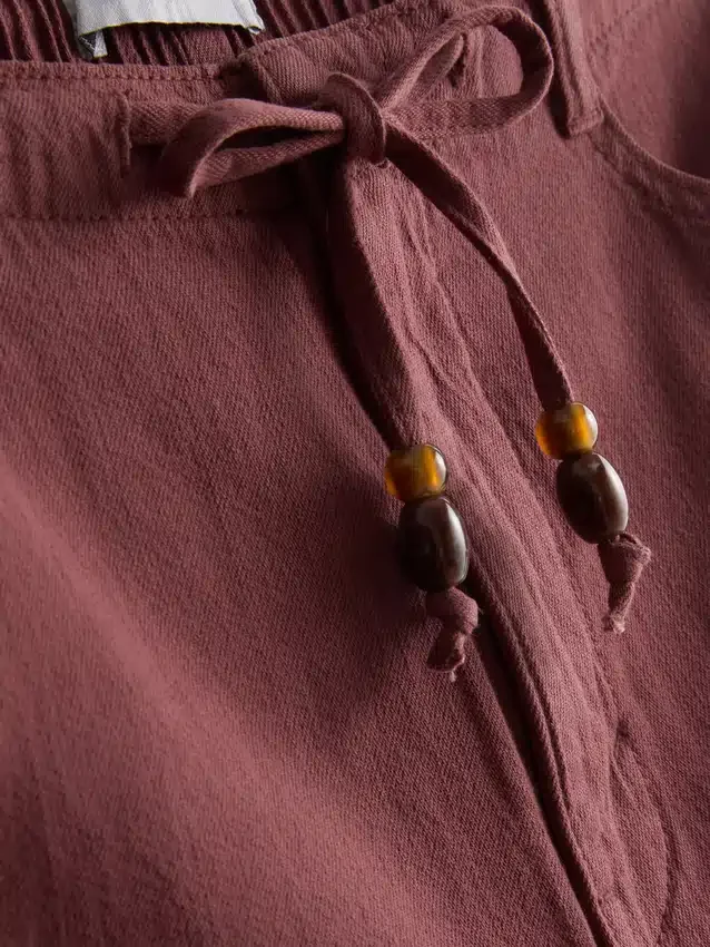 Pantalones cortos de algodón con cordón y cuentas