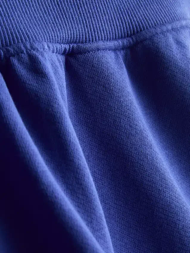 Pantalones cortos de algodón con dobladillo abierto