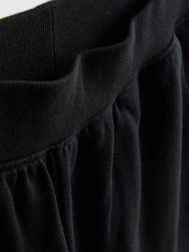 Pantalones cortos de algodón con dobladillo abierto