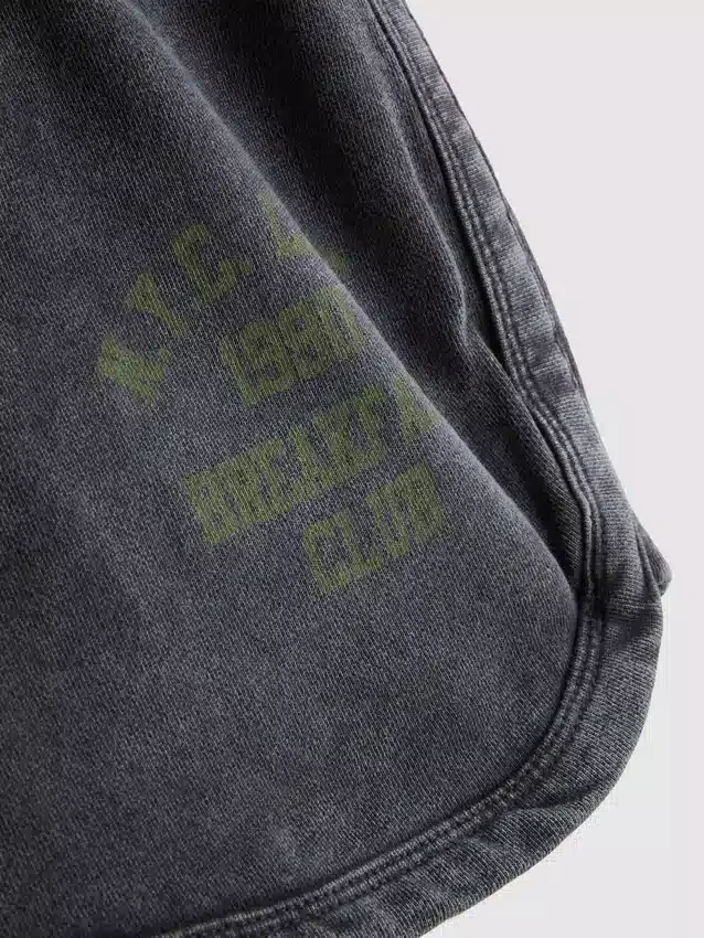Pantalones cortos de club de corredores con alto contenido de algodón