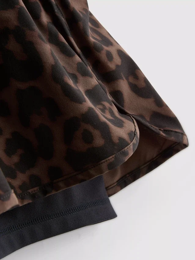 Pantalones cortos de correr con estampado de leopardo