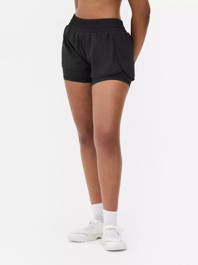 Pantalones cortos de correr tejidos
