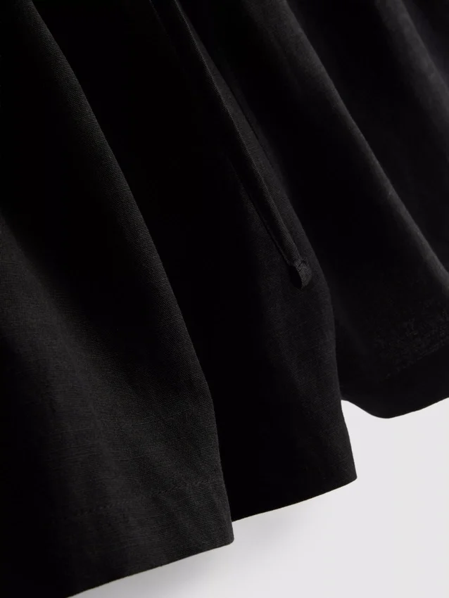 Pantalones cortos de mezcla de algodón con cintura elástica