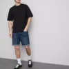 Pantalones cortos de mezclilla ajustados de talle medio