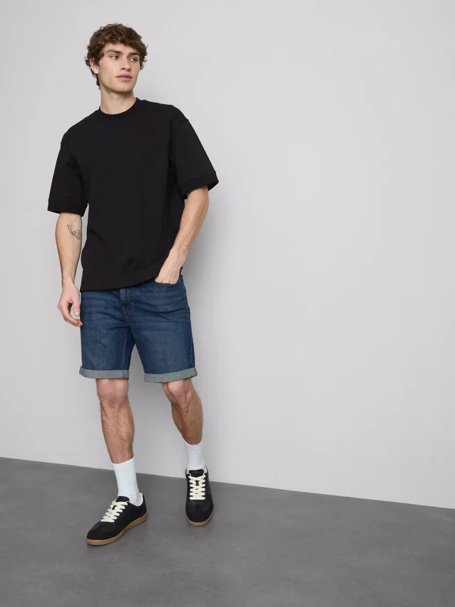 Pantalones cortos de mezclilla ajustados de talle medio