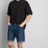 Pantalones cortos de mezclilla ajustados de talle medio