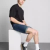 Pantalones cortos de mezclilla ajustados de talle medio