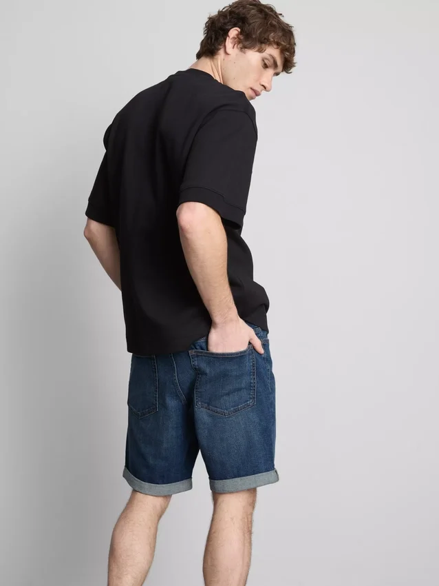 Pantalones cortos de mezclilla ajustados de talle medio
